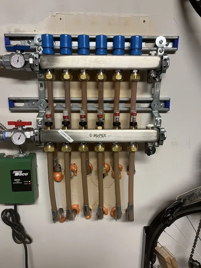 Plumber performing Water Heater Repair at a residential property in Thomson